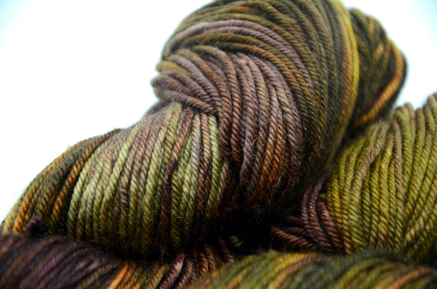 Hand-Dyed & Hand Painted Yarn with dark tones and notes of green