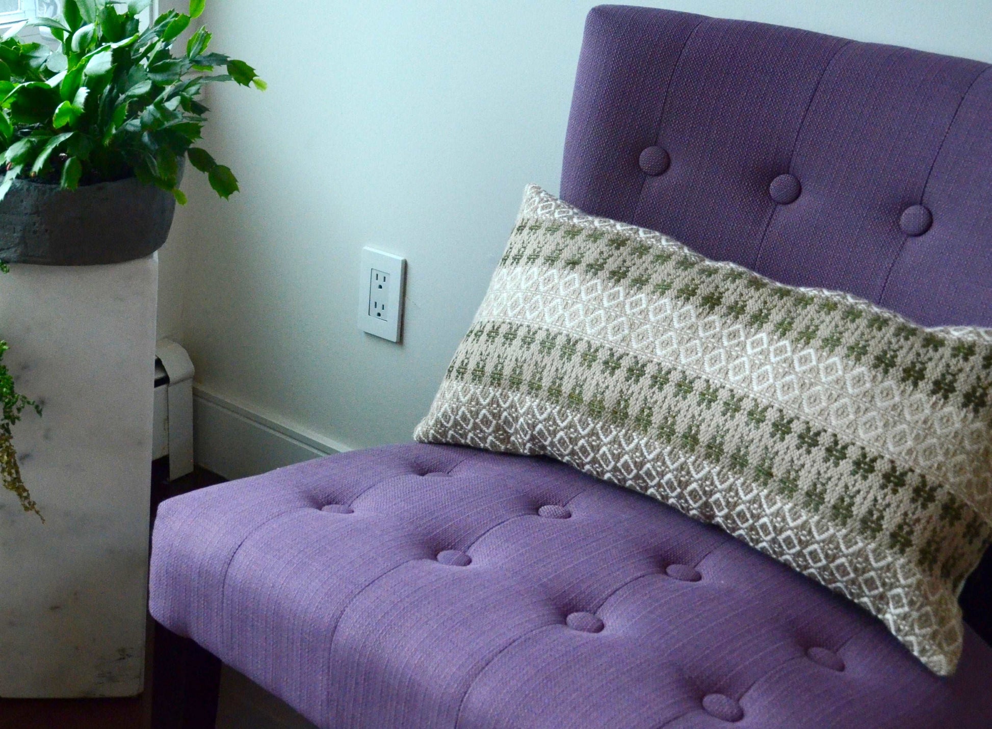 Neutral Cream colored handwoven throw pillow with sage woven details