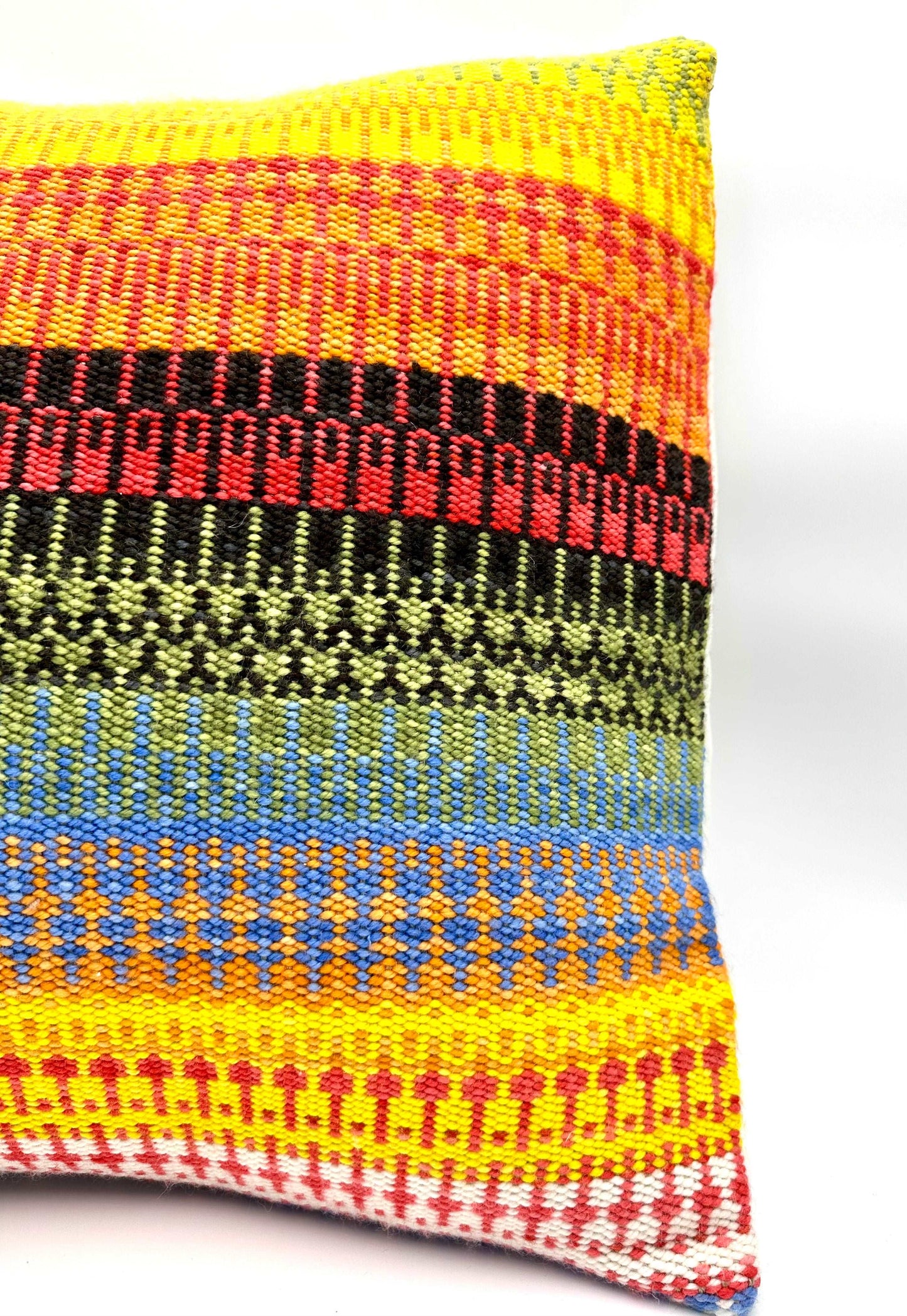 Handwoven throw pillow cover with bright and summer like warm tones of yellow, orange, green and blue