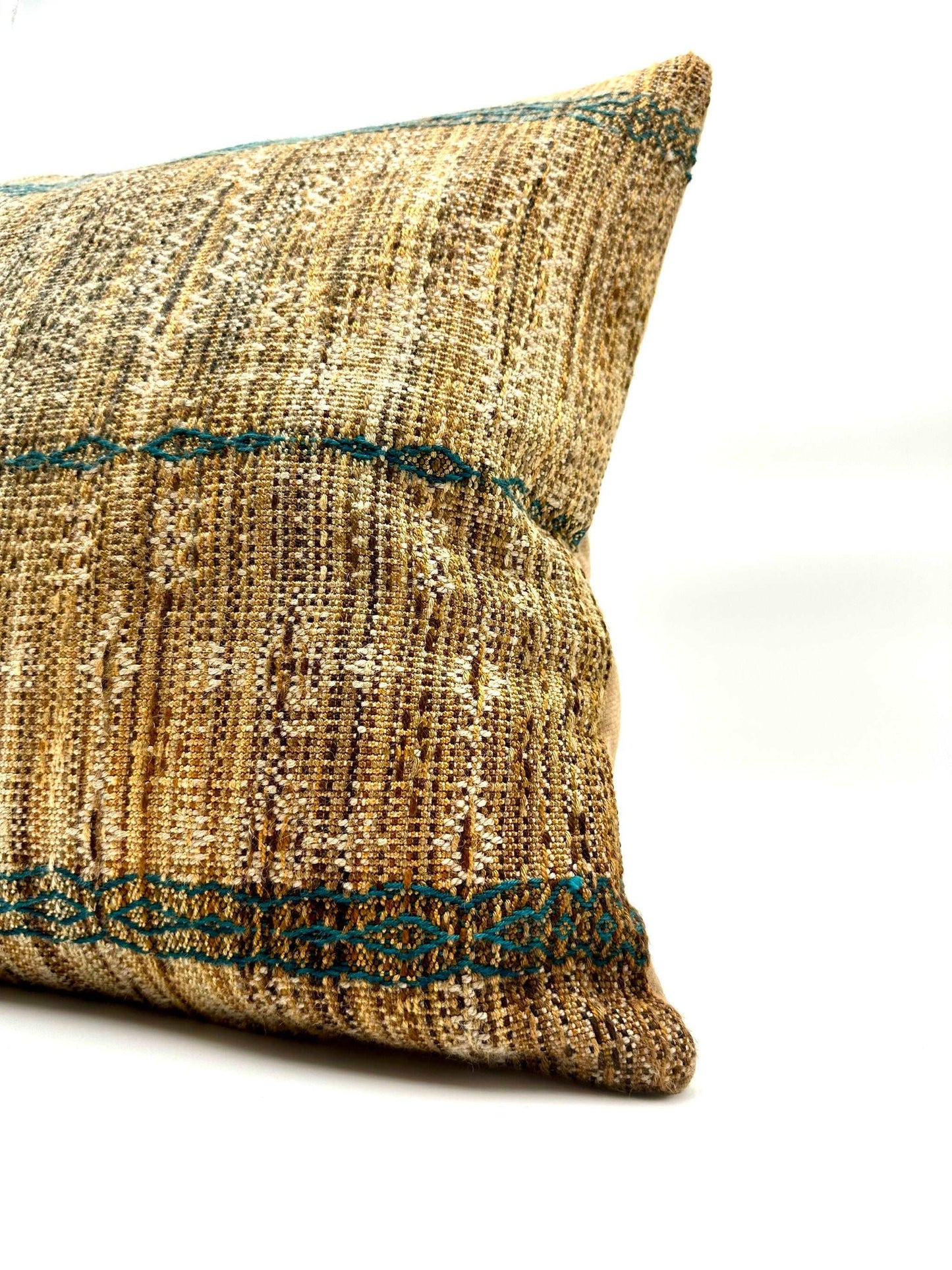 Neutral Warm Toned Handwoven throw pillow with turquoise detailing