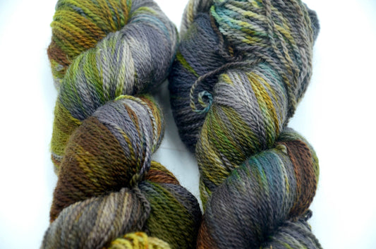 Hand-Dyed & Hand Painted Yarn with notes of green, blue, brown and gray