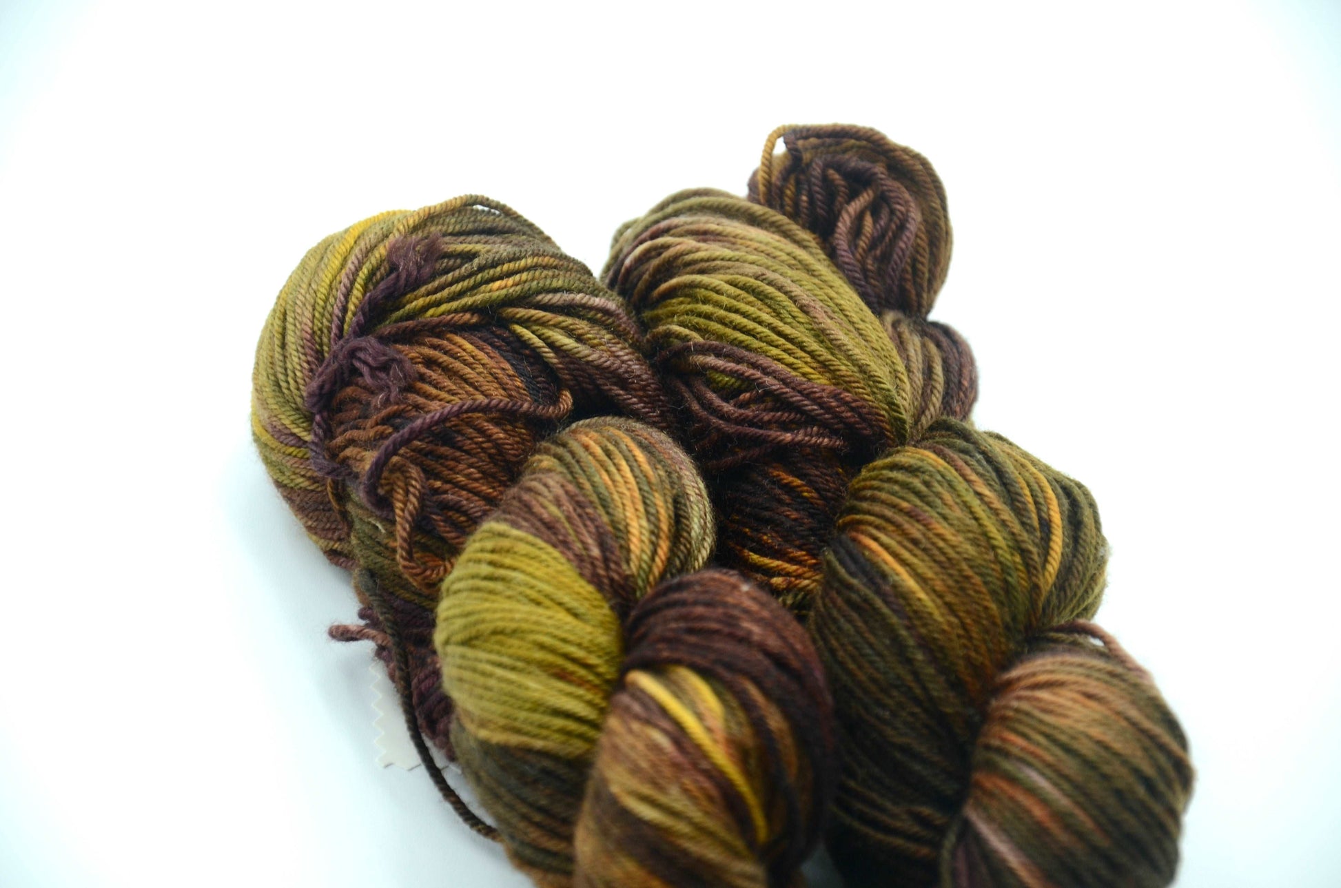 Hand-Dyed & Hand Painted Yarn with dark tones and notes of green