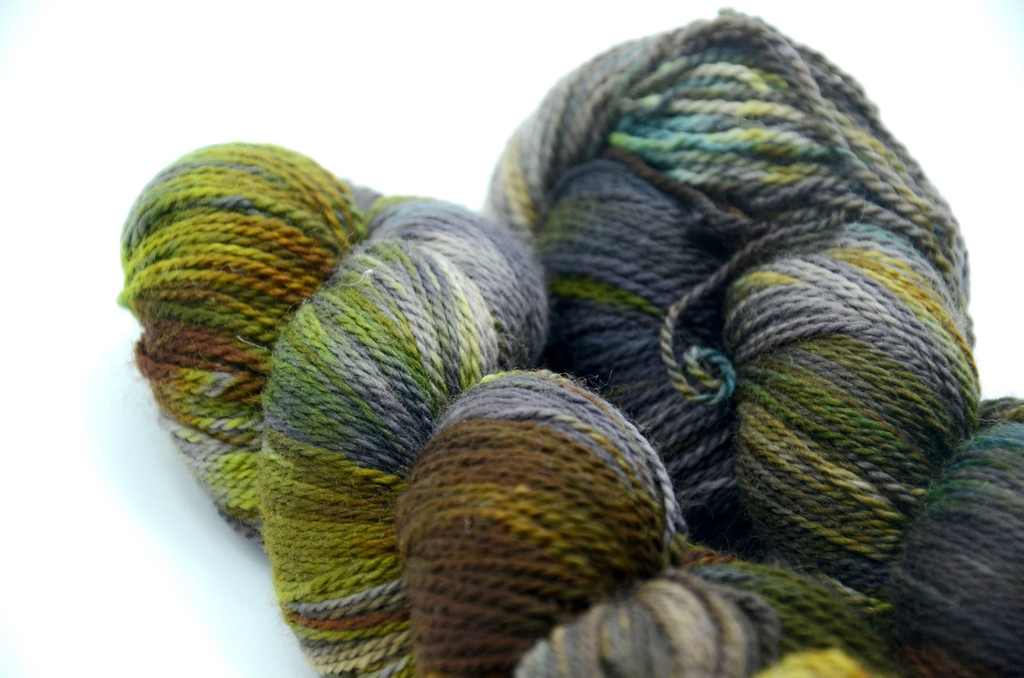 Hand-Dyed & Hand Painted Yarn with notes of green, blue, brown and gray