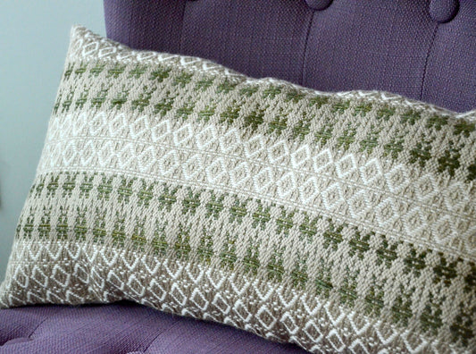 Neutral Cream colored handwoven throw pillow with sage woven details