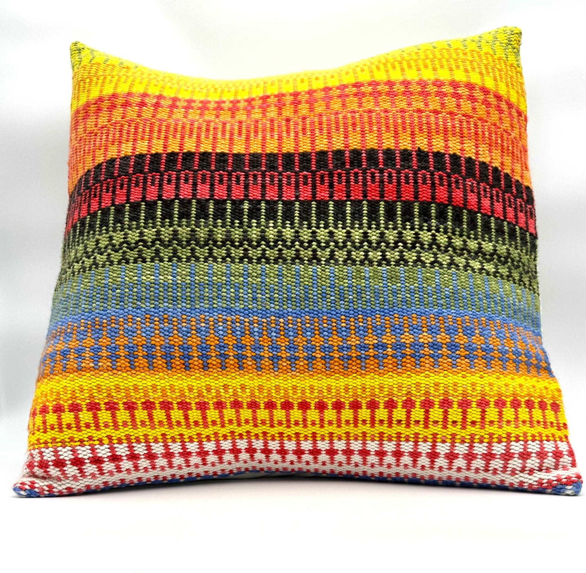 Handwoven throw pillow cover with bright and summer like warm tones of yellow, orange, green and blue